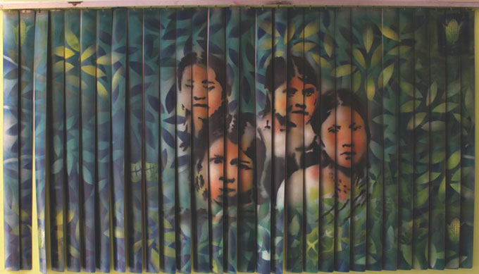 La Escuela de Cultura Popular Revolucionaria Mártires del '68, Blinds, 2003. Photo of an intervention with templates alluding to the plights of indigenous Mexican communities.