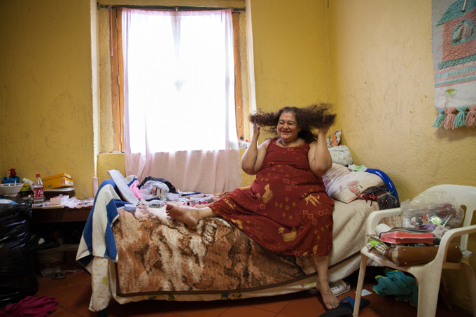 Portrait of María Isabel in her bedroom. Photo by Benedicte Deserus, 2013.
